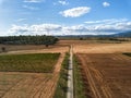 Farmland and agricultural production background in an aerial view from a drone. Agriculture and food production