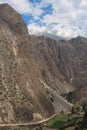 Farmland and a dirt road in a valley in the Andes Mountains in the Cusco Region of Peru Royalty Free Stock Photo