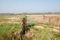 Farmland gate. Country walk along rural Norfolk Broads farm land Royalty Free Stock Photo