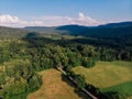 Farmland mountain forests and haystack overlook by DJI mavic mini