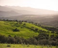 Farmland And Mountain Range In Misty Twilight Royalty Free Stock Photo