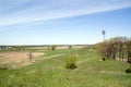 Farms and a wind-pump tower Royalty Free Stock Photo