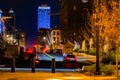 Farnam Street Omaha at night with WoodmenLife building in the distance. Royalty Free Stock Photo