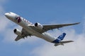Airbus A350-941 commercial aircraft with a hybrid Airbus/Qatar Airways livery