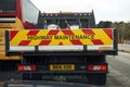 Farnborough, UK - March 28th 2017: Rear of a UK Highway Maintenance truck in a motorway traffic queue