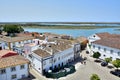 The old city, white buildings with a brown tiled roof, small lakes