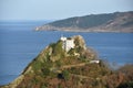 The Faro de la Plata Llighthouse and Cantabrian Sea. Monte Ulia, Pasaia, Gipuzkoa, Basque country, Spain