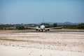 Faro, Portugal - July, 2018: Airliner from Ryanair takes off from Faro international airport FAO during daytime.