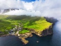 Faroe islands - Aerial panoramic view of the village of gjogv on cliffs washed by the ocean, Eysturoy island, Denmark, Europe Royalty Free Stock Photo
