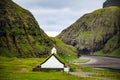 Faroe Islands, Europe. Grass roofs and church in Saksun