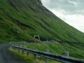 Road and tunnel entrance on the slope of the mountain Royalty Free Stock Photo