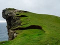 TrÃÂ¦lanÃÂ­pan or Slave cliffs covered with green grass. Famous spot on Faroe Island