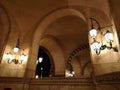 Farols and archs at the entrance of Louvre Museum at night