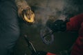 Farrier hot shoeing a hoof Royalty Free Stock Photo