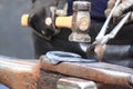 Farrier making a horseshoe