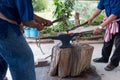 Farrier making horseshoe