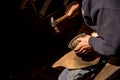 Farrier Shoeing a Horse