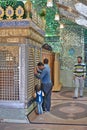 Worshippers inside Sayyed Alaeddin Hossein Mosque, Mirrored mausoleum, Shiraz, Iran. Royalty Free Stock Photo