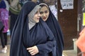 Two young Muslim women are walking around city, Shiraz, Iran. Royalty Free Stock Photo