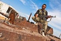 FAS fighter posing on tank, Azaz, Syria.