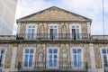 Fasade Casa do Ferreira das Tabuletas on Trindade street covered with yellow tiles azulejo Royalty Free Stock Photo