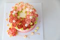 Fascinating cream topping of cake creatively designed as charming bouquet of blooming roses served for amazing party present and Royalty Free Stock Photo