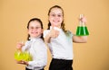 Fascinating experiment. Basic knowledge. Knowledge day. Schoolgirls friends with chemical liquids. Childhood and