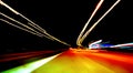 Fascinating mysterious beautiful abstract view of the night highway with lines of lights from cars Royalty Free Stock Photo