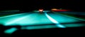 Fascinating mysterious beautiful abstract view of the night highway with lines of lights from cars Royalty Free Stock Photo