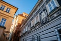Fascinating narrow picturesque street Jansky vrsek with baroque and renaissance historical house richly decorated with sgraffito,