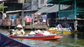 Fascinating shot of people selling souvenirs on river in their colorful boats.