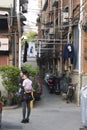 Fascinating streets and trades of Shanghai, China: one of the lanes of the French Concession