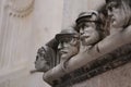 Fascinating view of famous faces on the side protal of Sibenik cathedral, Chroatia