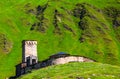 A fascinating view on Ushguli village at the foot of snow-capped Mt. Shkhara. Location place Lamaria Church Jgrag, Upper Svaneti. Royalty Free Stock Photo