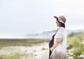 Fashinable pregnant woman on the beach Royalty Free Stock Photo