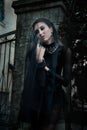 Fashiom model dressed in gothic style. Vamp. Royalty Free Stock Photo