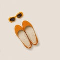 Fashion accessories for the beach - shoes and orange glasses on Royalty Free Stock Photo