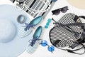 Fashion accessories in black and white and blue colors - hat clothing, shoes and bag, bracelets and glasses. Royalty Free Stock Photo