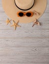 Fashion accessories - hat, glasses orange color on a wooden bac Royalty Free Stock Photo