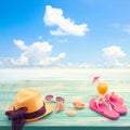 Fashion Accessories Summer Flip Flops, Hat, Glasses On Bright Turquoise Blue Board On The Beach