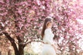 Fashion Art Beauty Portrait. Beautiful Girl in Fantasy Mystical and Magical Spring Garden. Model Royalty Free Stock Photo