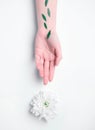 Fashion art hand woman in summer time and flowers on her hand with bright contrasting makeup. Creative beauty photo hand Royalty Free Stock Photo