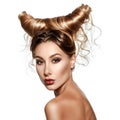Fashion art portrait of beautiful woman with horns.