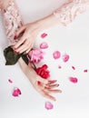 Fashion art portrait woman in summer dress and flowers in her hand with a bright contrasting makeup. Creative beauty photo girls Royalty Free Stock Photo