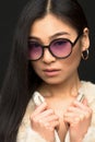 Fashion asian model woman in sunglasses in studio Royalty Free Stock Photo