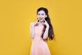 Fashion asian young girl. Portrait on yellow Royalty Free Stock Photo