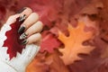 Fashion autumn nail art. Autumn background. Fashion background.