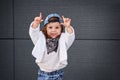 Fashion baby girl hip hop.a little girl in a baseball cap. Royalty Free Stock Photo