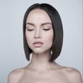 Fashion beautiful brunette with short haircut. studio portrait