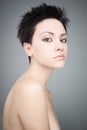 Fashion beautiful brunette with short haircut. studio portrait